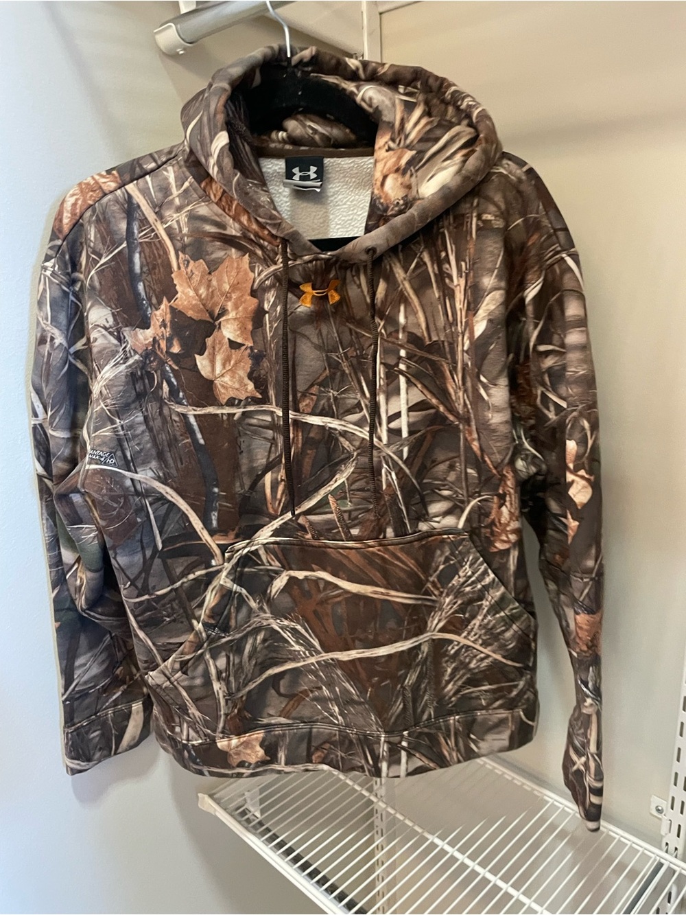 Under Armour Realtree camo hoodie with brown, beige, and green tree bark pattern